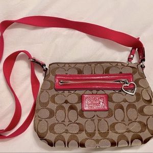 Coach signature small brown purse with bright pink trim